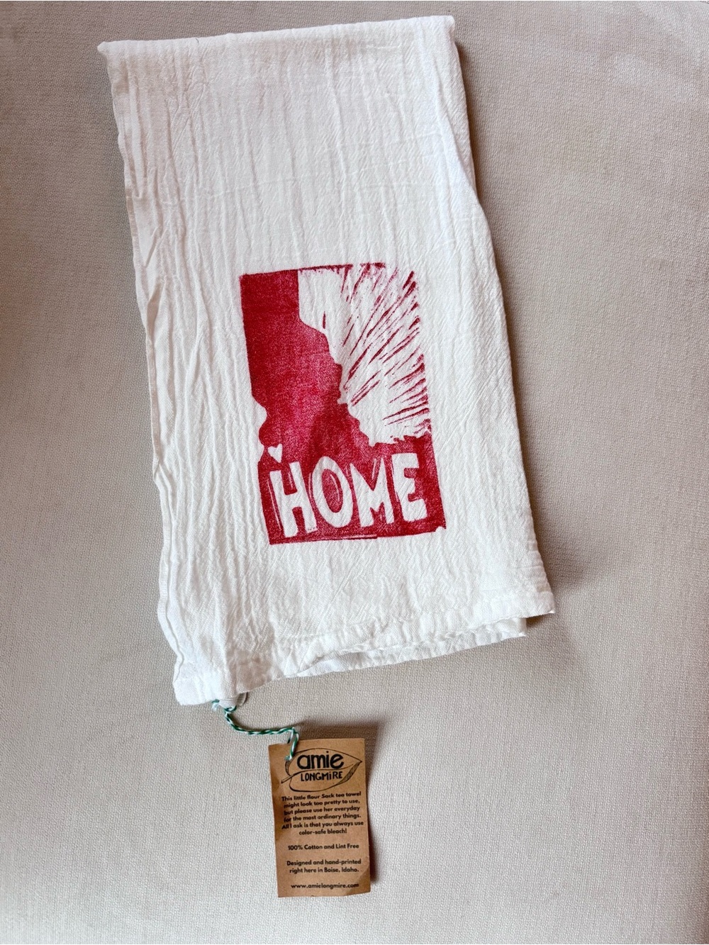 White Kitchen Tea Towel with Red Idaho “HOME" Print